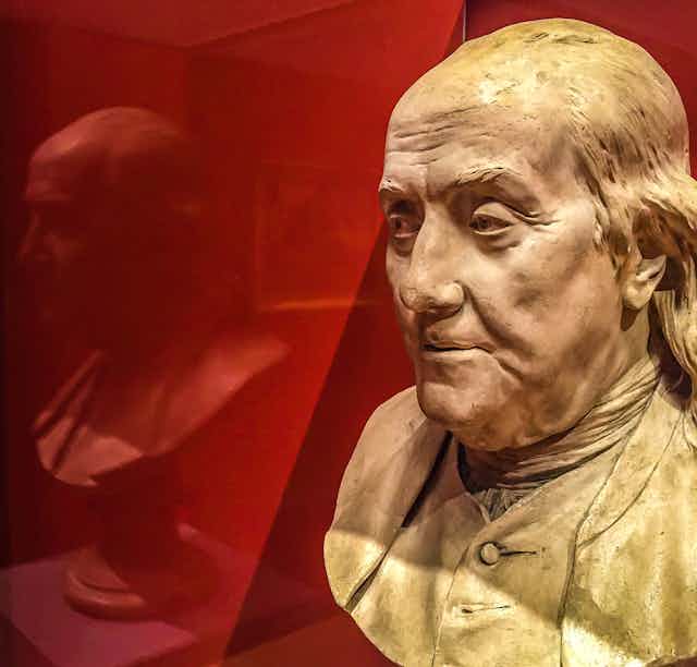 A bust of Benjamin Franklin.