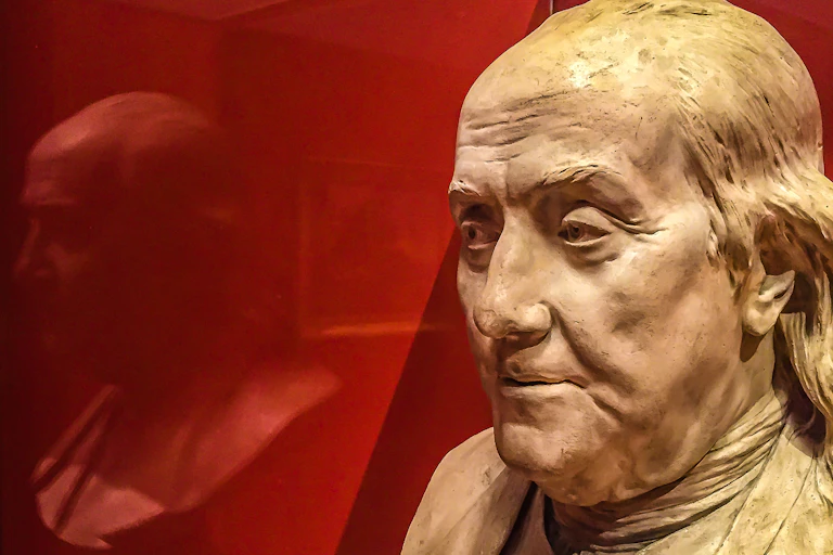 A bust of Benjamin Franklin.
