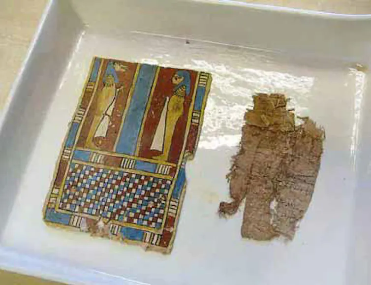 Artefacts shown in a flat container.