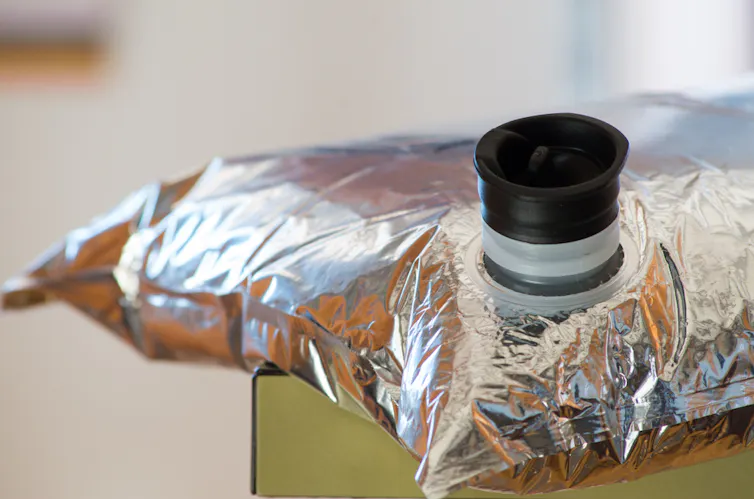 A cask wine bag sitting on a table