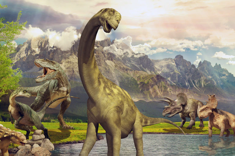 Dinosaurs in a lake with mountains in the background.