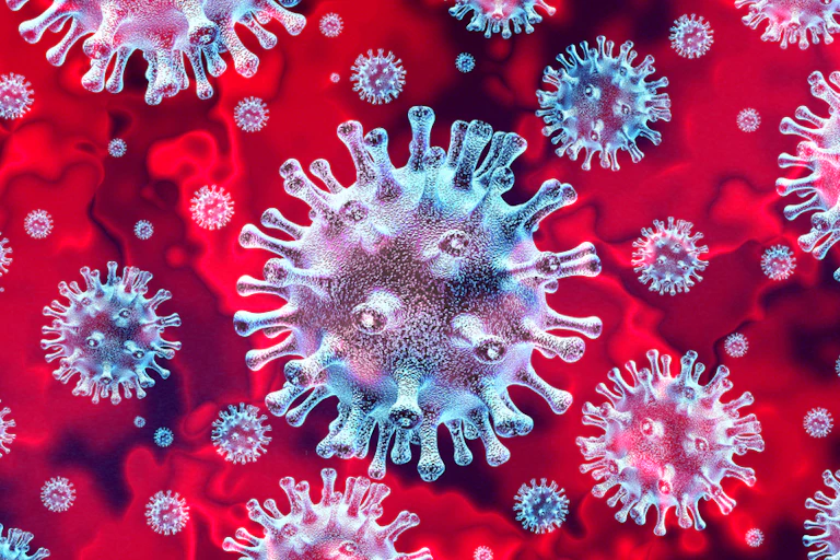 A graphic showing lots of coronavirus particles.