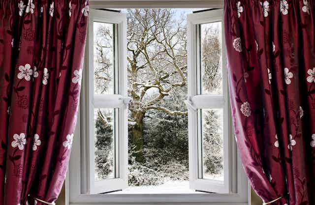 A window opens onto a snowy landscape.