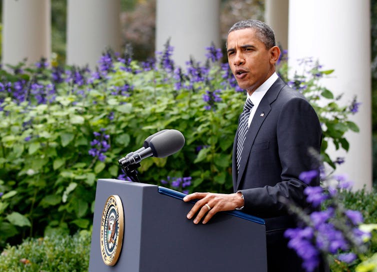 US president standing at a lectern in the Rose Garden outside the White House, Washington DC, October 2011.