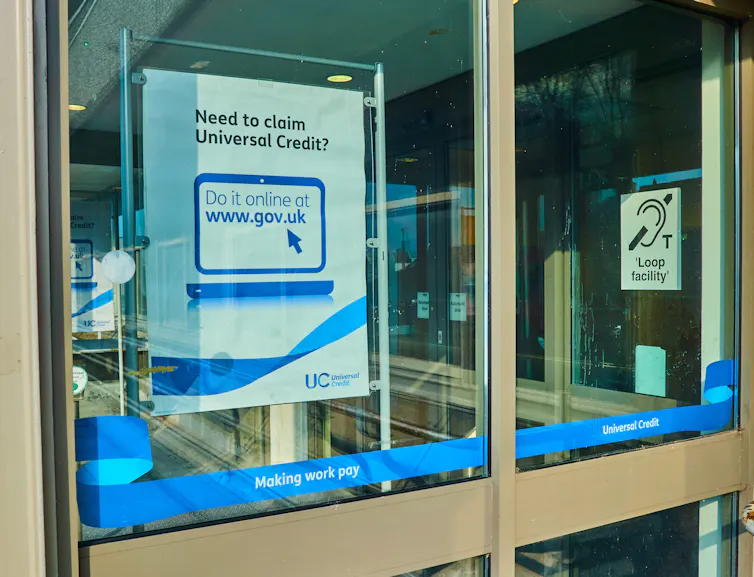 Poster on window that says