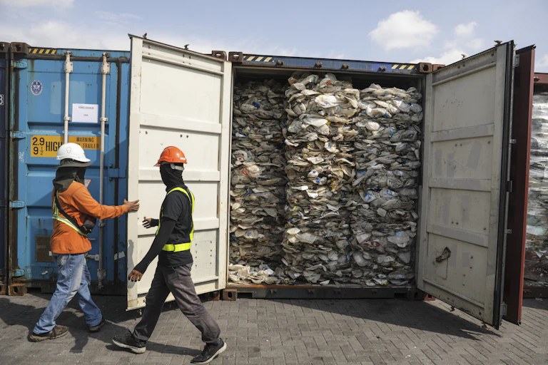 Imported plastic waste inside shipping container.