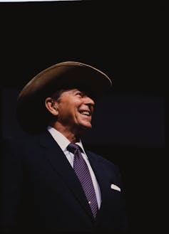 Ronald Regan wearing a cowboy hat