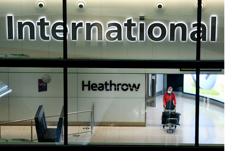 Passenger arriving at Heathrow Airport in London, England