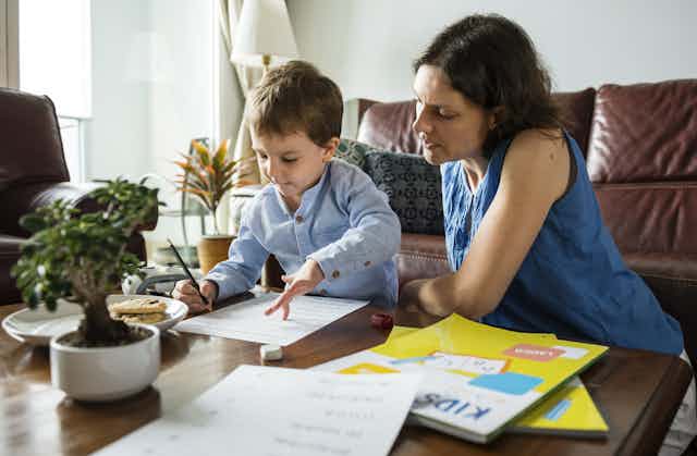 Parent supervising child education at home