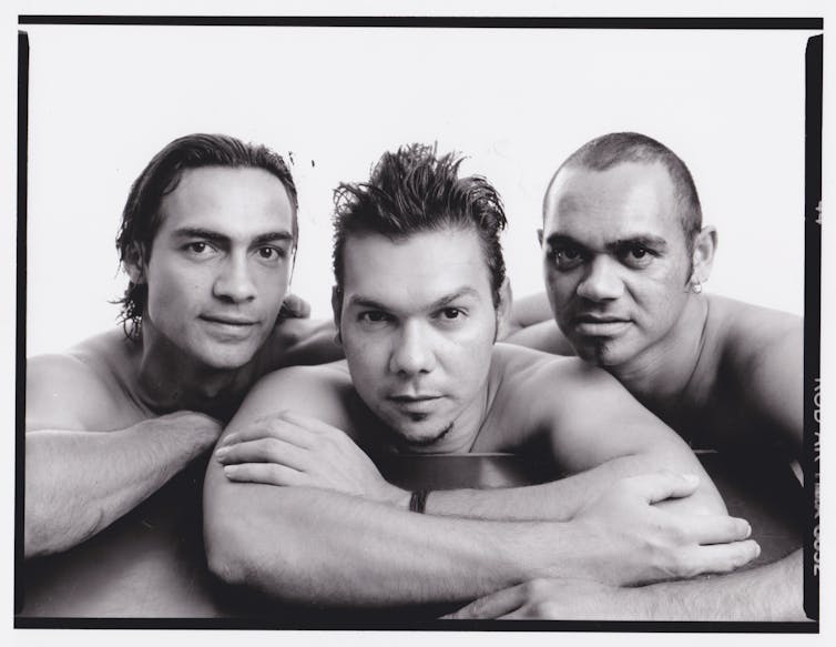 Photo portrait of three men.