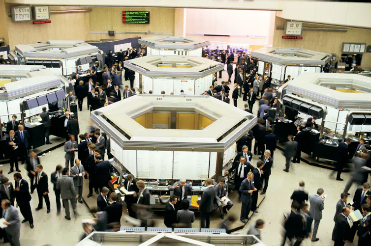 Traders on the floor of the London Stock Exchange a few days before the Big Bang of 1986.