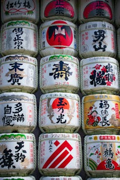 Colorful wine barrels stacked in Tokyo.