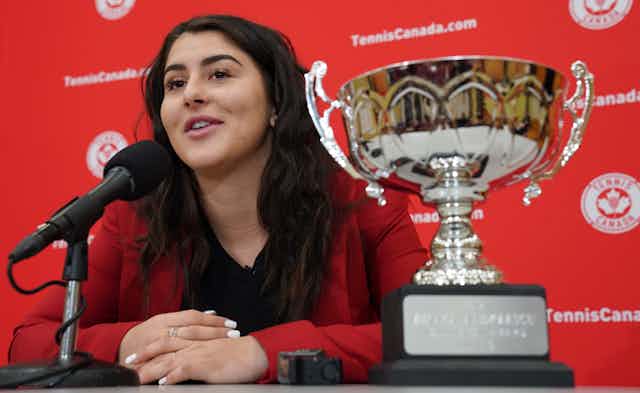 Bianca Andreescu at a microphone with the Lou Marsh