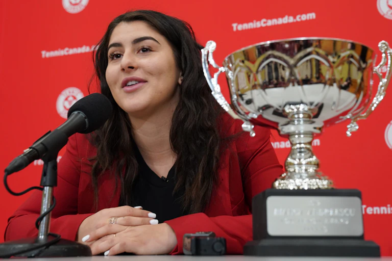 Bianca Andreescu at a microphone with the Lou Marsh