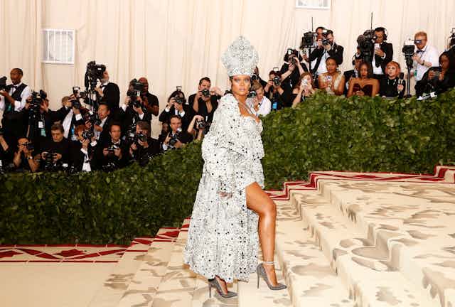 Rihanna on the Met Gala red carpet, dressed as a sexy pope.