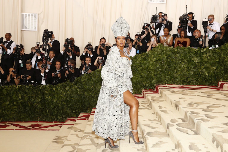 Rihanna on the Met Gala red carpet, dressed as a sexy pope.