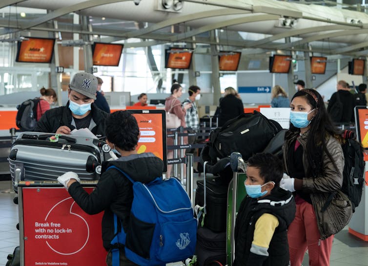 Travelers with masks