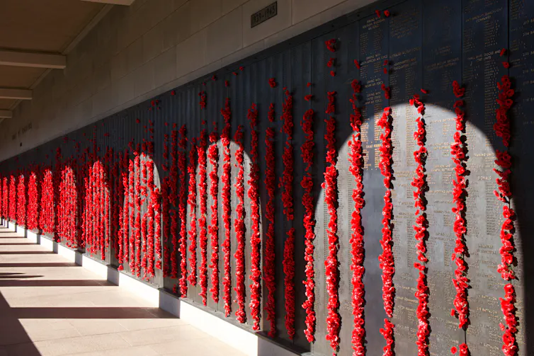 Hallway of the Australian War Memorial decorated with poppies.