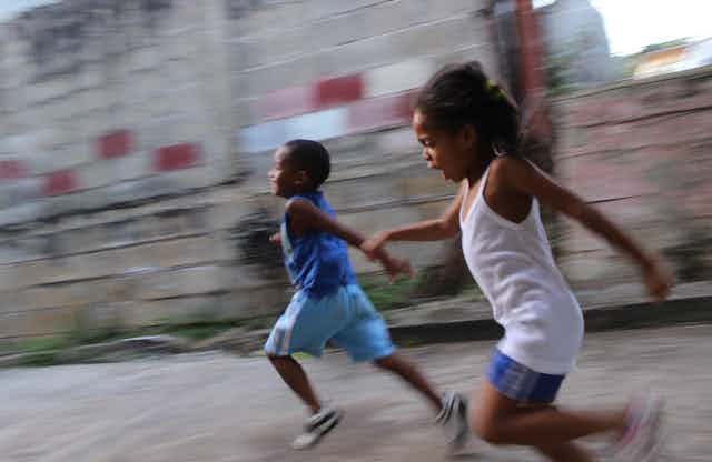 Two children running