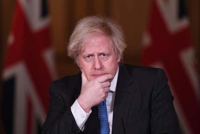 Boris Johnson giving a daily briefing.