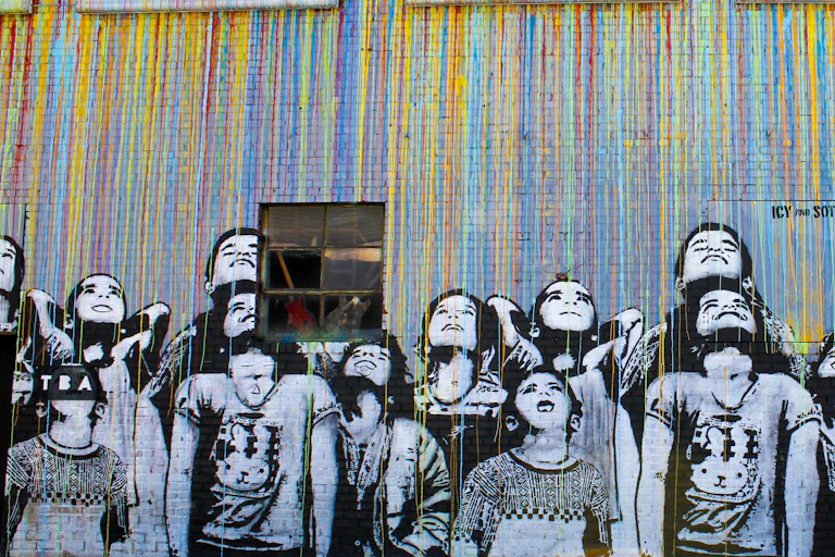 A graphic of schoolchildren painted on a wall.