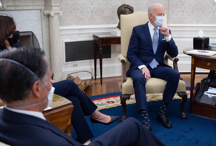 Mitt Romney meeting with Kamala Harris and Joe Biden in the Oval Office.