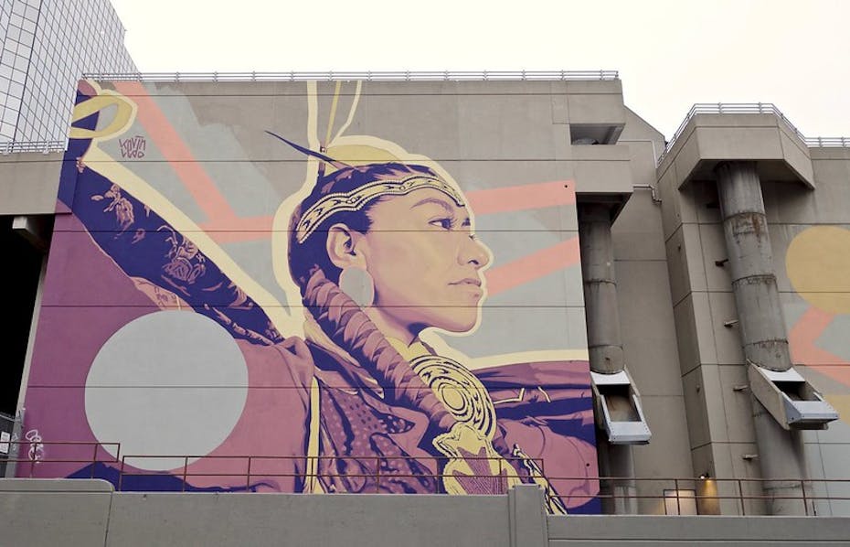 A mural showing an Indigenous woman.