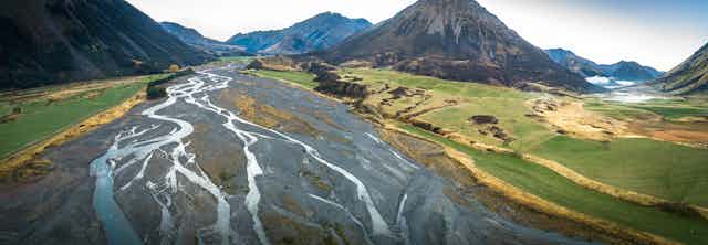 Braided river with mountains in the backdrop