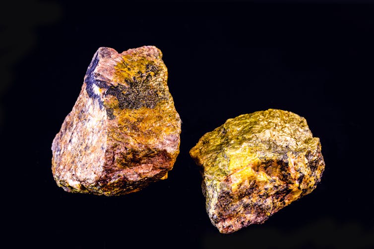 Two pieces of uranium mineral.