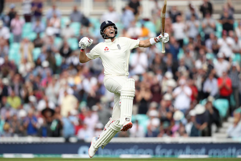 ENgland men's cricket captain Joe Root jumps and punches the air after scoring 200 runs.