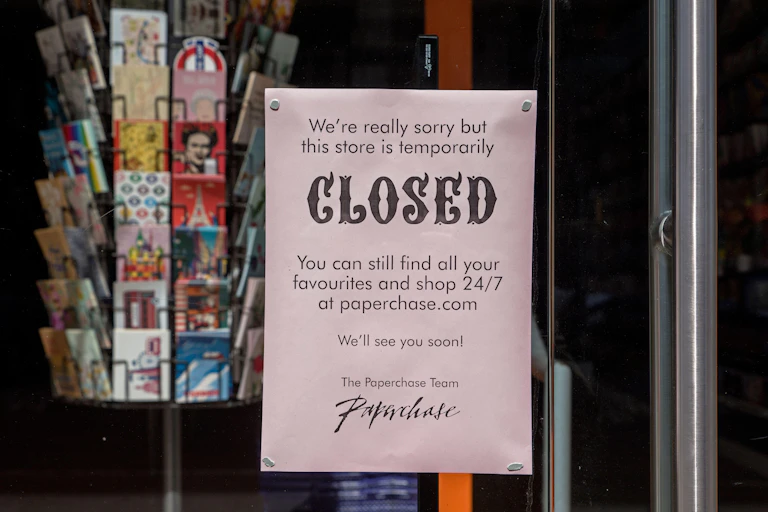Paperchase shop window with a closed sign
