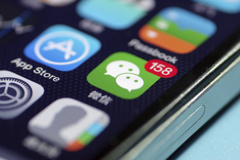 Photo of a phone screen showing the WeChat icon.