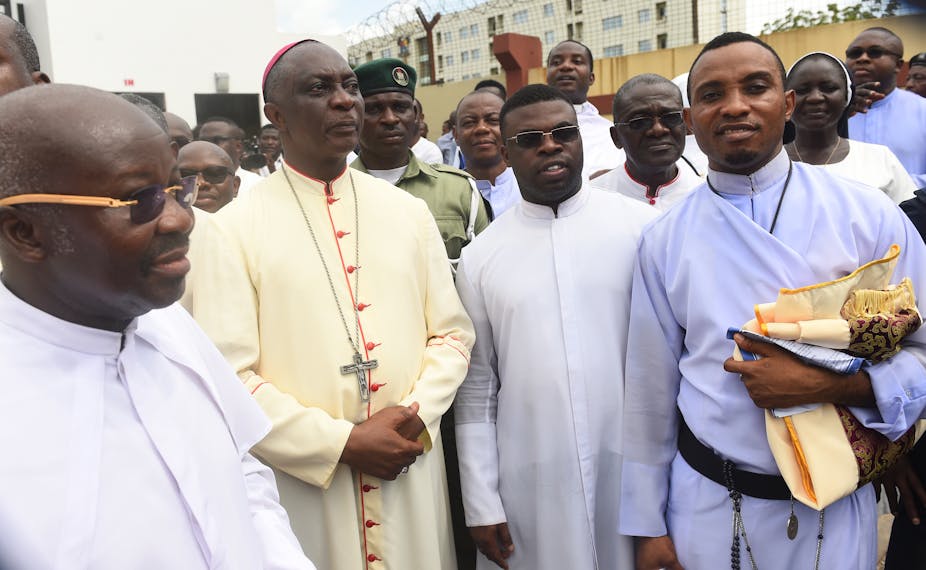 Catholic Archbishop of Lagos Alfred Adewale Martins (2nd L) and other senior members of the diocese in a procession in Lagos