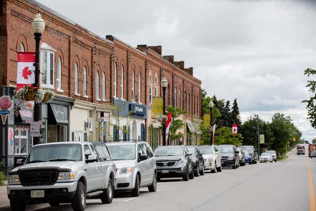 Row of parked cars on a main street