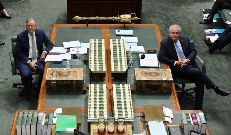 Labor leader Anthony Albanese and Prime Minister Scott Morrison look towards the Speaker's chair in Parliament.