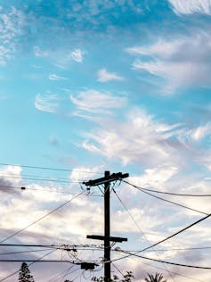 telephone lines against the sky