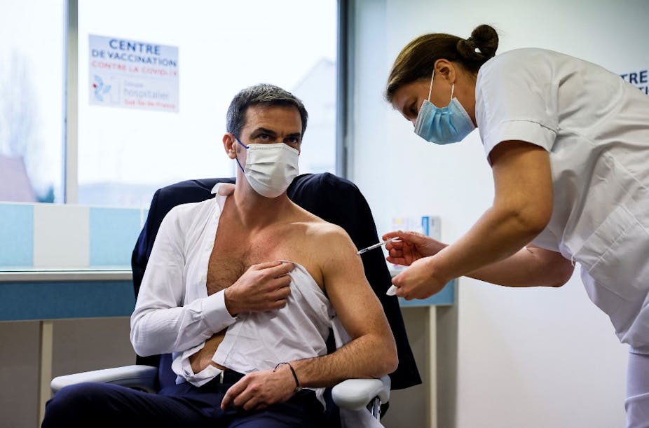 French Health Minister Olivier Véran receives a dose of Covid-19 vaccine on February 8, 2021.