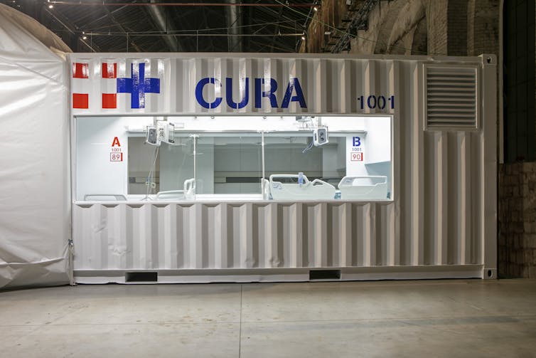 A shipping container adapted for use as an intensive care unit