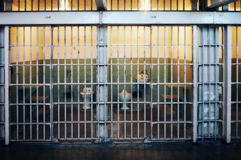 A jail cell and bars