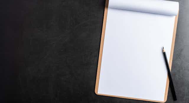 A blank clipboard with pencil.