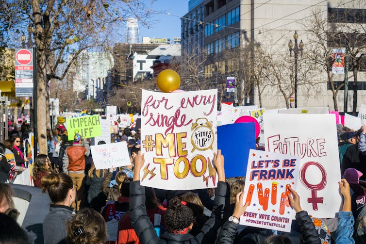 Women rallying at a #metoo event.