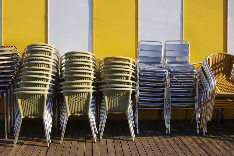 Stacked chairs at a closed restaurant