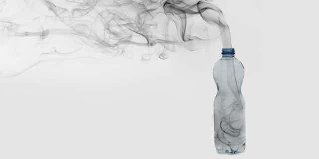 Smoking rising out of a plastic bottle