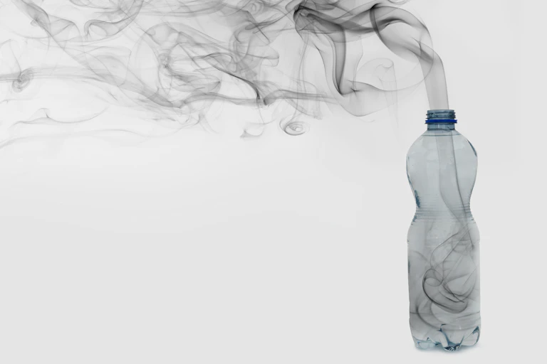Smoking rising out of a plastic bottle