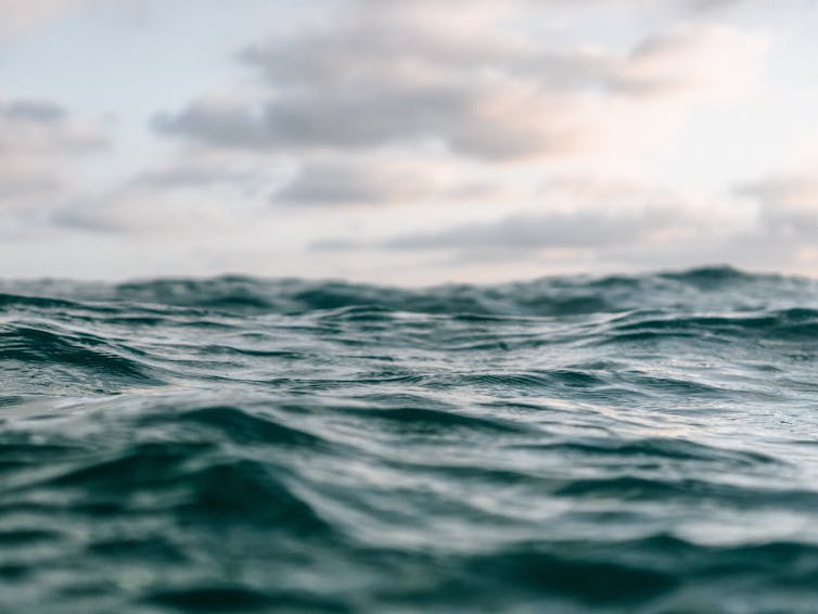 Waves at the ocean surface.