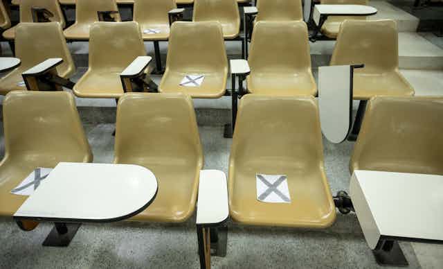 University chairs, some marked with x's.