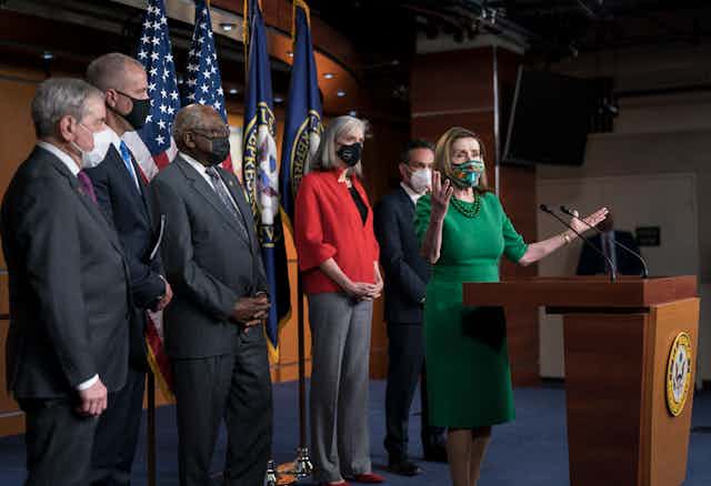 House Democratic leader Nancy Pelosi and top Democrats at a press conference
