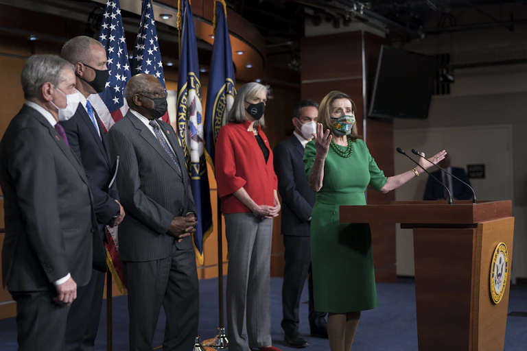 House Democratic leader Nancy Pelosi and top Democrats at a press conference