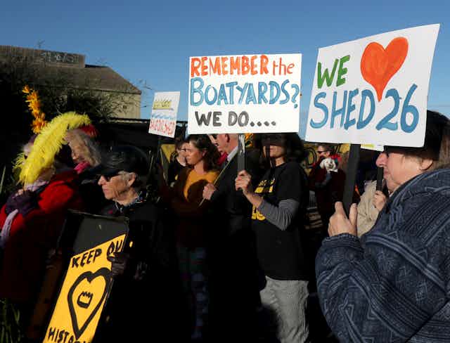 Protesters against the demolition of a waterfront shed