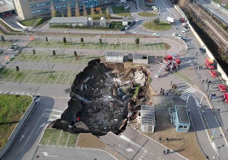 Aerial view of big chasm in carpark.